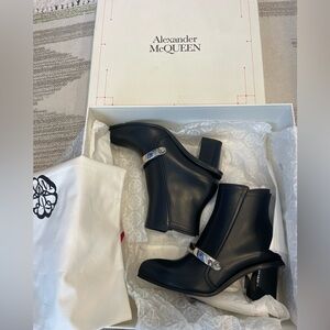 Alexander McQueen Leather Ankle Boot with Metal Bar.